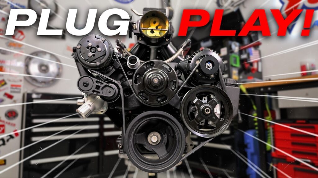 A close-up of the Summit Racing Lost Bracket accessory drive system showing the alternator and water pump mounting.