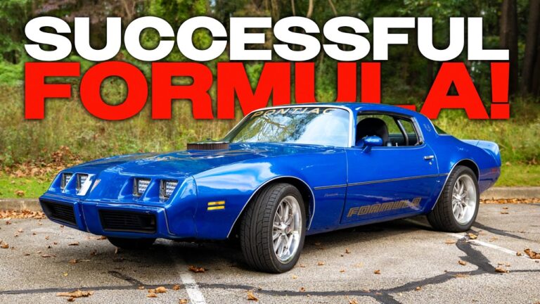 A modified 1981 Pontiac Firebird showing off a shaker-style hood cut and custom interior.